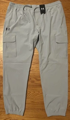 ¡NUEVO CON ETIQUETAS! Pantalones cargo para hombre Under Armour UA Vibe tejidos grises cónicos 2XL $80 ¡AGOTADOS! Foto 1 de 4