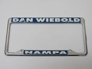 Vintage Dan Wiebold Ford Nampa Idaho Metal License Plate Frame Embossed ID Cover - Picture 1 of 3