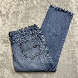 Ariat FR M4 Relaxed Boot Cut Jeans Herren Größe 48x32 Blau Denim Arbeitsjeans - Bild 1 von 16