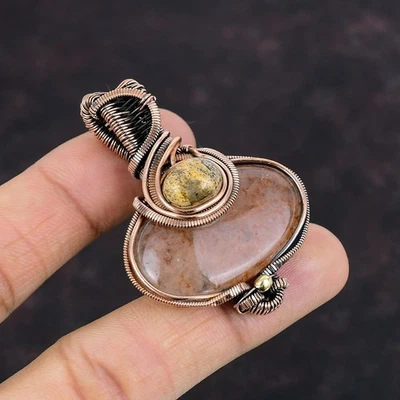 Joyería colgante envuelta en alambre étnico jaspe piedra solar ovalada de cobre Foto 1 de 4