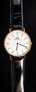 Reloj de cuarzo vintage Daniel Wellington tono oro rosa para hombre--funciona, caja Ø35 mm - Imagen 1 de 7