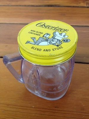 Taza envase de plástico transparente Oster Osterizer mini mezcla tienda vintage con tapa Foto 1 de 4
