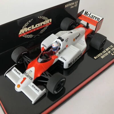 1986 Alain Prost McLaren Tag MP4/2C – Minichamps – 1:43 Scale (British GP) - Image 1 of 4