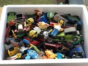 A box full of Collectible Vintage and Rare Diecast & Plastic Cars And Figurines - Picture 1 of 7