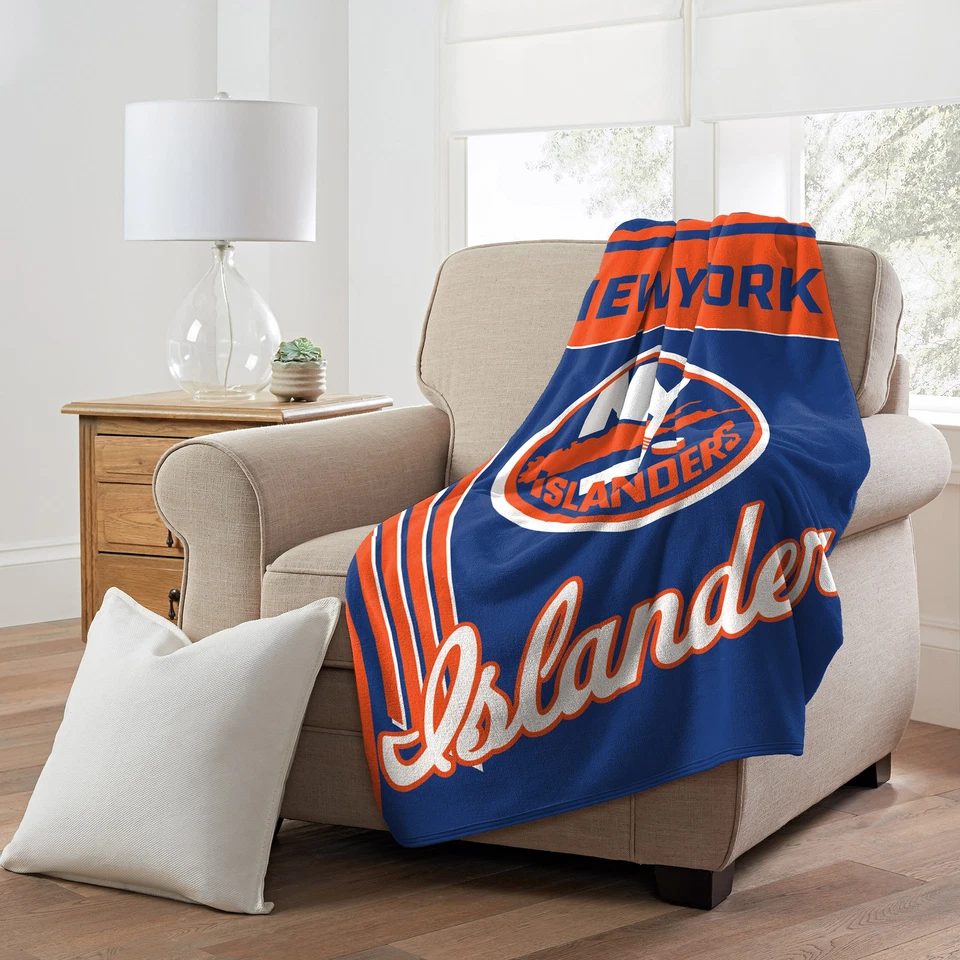 Manta de microfibra 46" x 60" con licencia oficial de los New York Islanders de la NHL Foto 1 de 4
