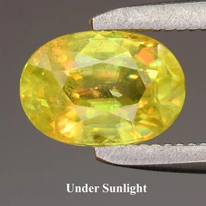 π 0.86ct Oval Natural Yellowish Green Sphene - Super Sparkles, Madagascar Gem - Picture 1 of 5