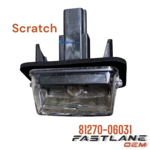 2014-2022 TOYOTA HIGHLANDER LICENSE PLATE LAMP ASSY NEW OEM 81270-06031 - Picture 1 of 8