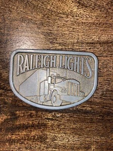Camión Raleigh Luces Metal Cinturón Hebilla Cigarrillos Tabaco Vintage Camionero Retro - Imagen 1 de 2