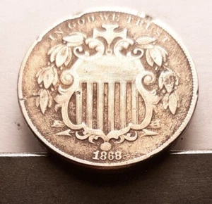 10)   1868 Shield Nickel (5c), VF+. Rim bumps & small scratches. - Picture 1 of 2