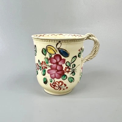 A fine floral-painted creamware coffee cup c1775-85. Possibly Yorkshire - Image 1 of 4