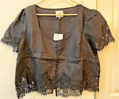 Top de encaje de lino Reformation Josie Foto 1 de 4