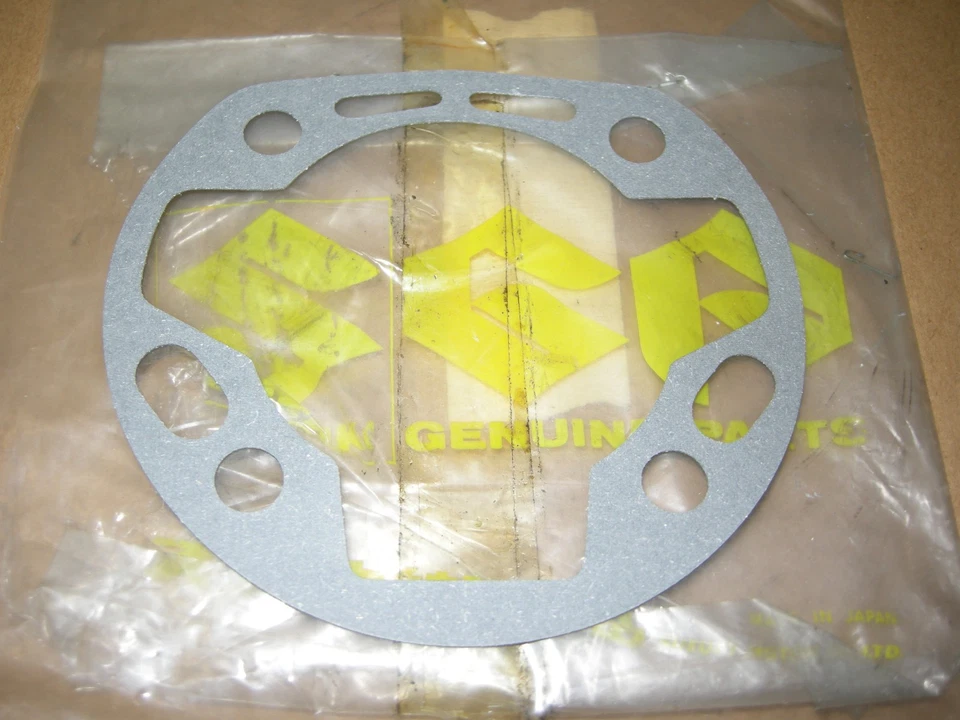 Junta de base de cilindro original do equipamento original Suzuki A100, AC100 AS100 '73-'79.   11241-12000 - Imagem 1 de 1