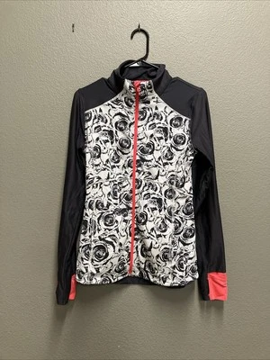 MPG Chaqueta Deportiva Mediana con Cremallera Mujer Camisa Floral Gris Oscuro Usada Foto 1 de 4
