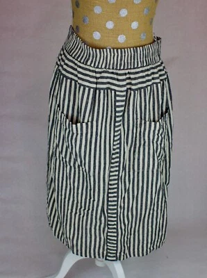 Falda midi Angie a rayas línea A con bolsillos delanteros (grande) Foto 1 de 4