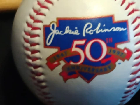 Jackie Robinson 50 year anniversary Ball never been played with and mini bat Cover