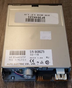Vintage Alps Electric 3.5" 1.44MB Black Floppy Disk Drive DF354H121F - Picture 1 of 4