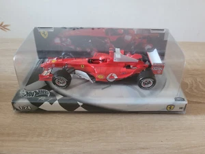Hot Wheels Ferrari F2002 Michael Schumacher 1:24 modellino auto IMBALLO ORIGINALE 2004 da collezione - Foto 1 di 5