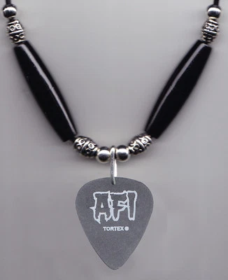 AFI Jade Puget Signature Black Guitar Pick Necklace - 2003 Sing The Sorrow Tour - Image 1 of 3