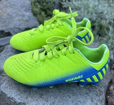 Botines de fútbol Vizari Santos Jr tierra firme niños aire libre talla 10C amarillo neón/azul Foto 1 de 4