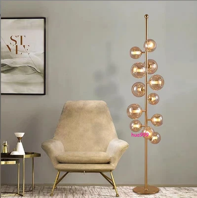 Modern minimalist Magic Bean Glass Living Room Floor Lamp Nordic Read Light Deco Foto 1 de 4
