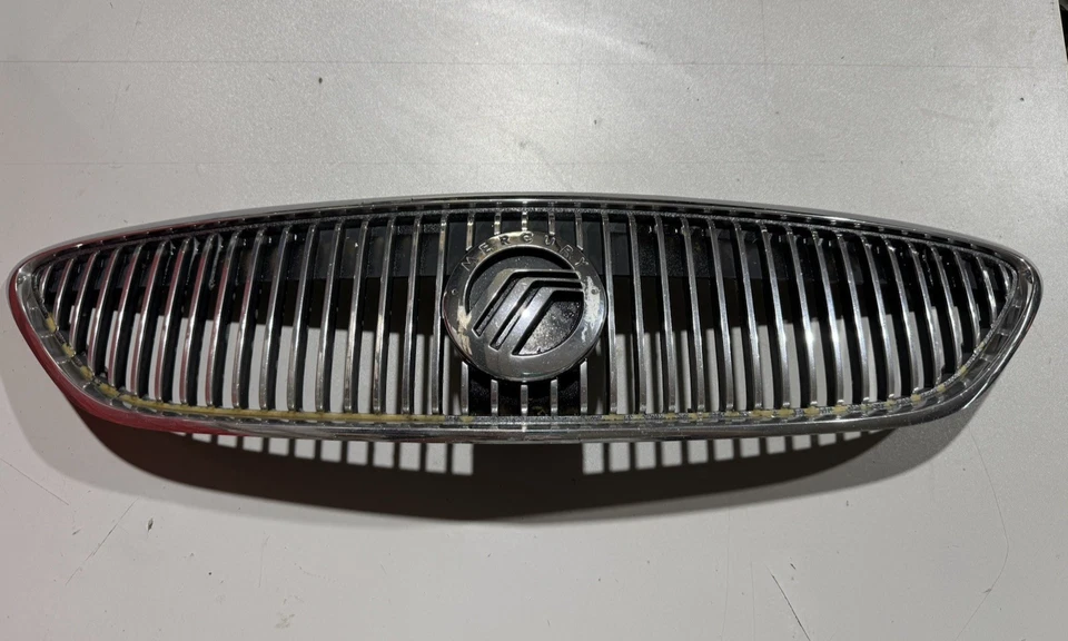 Mercury Sable 2004 cromo parrilla delantera montaje carcasa p/n 4F43-8200-aa usado OEM Foto 1 de 4
