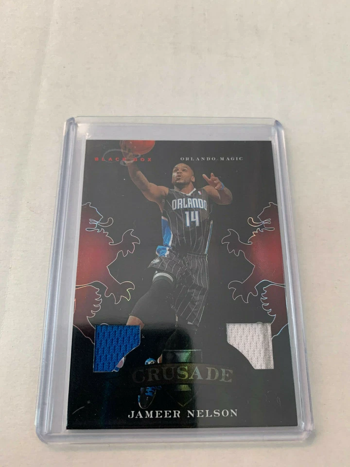Jameer Nelson 2010-11 Crusade Dual Jersey Card #14 Serial #62/99 - Image 1 of 1