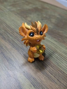 Figura de dragones y bestias caléndula retirada figura de vinilo gema naranja - Imagen 1 de 12