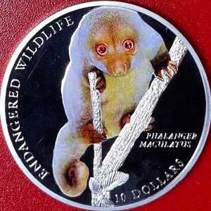 2010 SOLOMON ISLANDS $10 SILVER PROOF CUSCUS SWAROVSKI CRYSTAL EYES WILDLIFE RRR - Picture 1 of 6