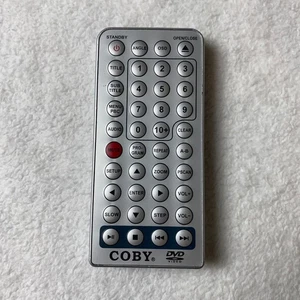 Control remoto reproductor de DVD COBY JX-2001C - OEM - Imagen 1 de 4