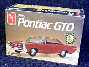 AMT 1965 PONTIAC GTO SCALA 1/25 MODEL KIT RICAMBI - SCATOLA APERTA - Foto 1 di 7