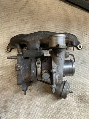 Бензиновый турбонагнетатель и коллектор Alfa Romeo Fiat 1,4 ТБ T-Jet 55222015 55213506 - Изображение 1 из 4