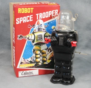 Robot de juguete vintage Tin Tom Space Trooper negro mecanismo de relojería litografía en caja y funcionando - Imagen 1 de 6