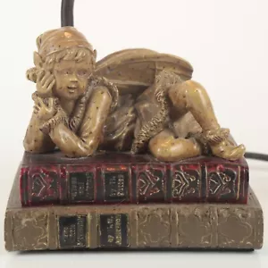 Fairy Boy Lying on Books Resin & Ceramic Table Lamp - No Shade - Damage to Base - Picture 1 of 8