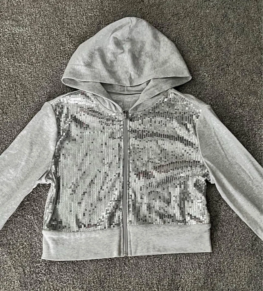 Chaqueta con capas de lentejuelas con cremallera para niñas - gris Justicia Foto 1 de 4