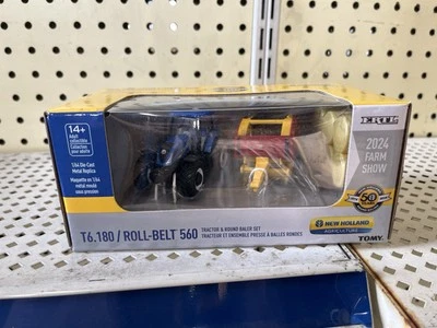 1/64 New Holland T6.180 & Roll-Belt 560 Round Baler 2024 Farm Show - Image 1 of 4