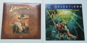 Pair DVDs ROMANCING THE STONE & INDIANA JONES LOST ARK" Paper sleeves used Good - Foto 1 di 4