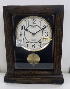 SEIKO MANTLE CLOCK WITH PENDULUM IN DARK WOOD WITH 12 HI-FI MELODIES QXW233BLH - Picture 1 of 4