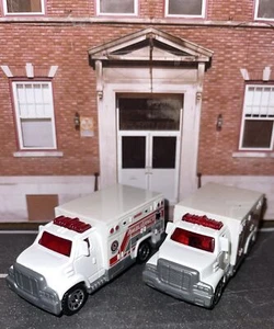 Lot Of 2 Matchbox City Ambulance International Harvester White NLFFP 1:64 Dicast - Picture 1 of 12