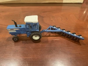 1/64 Ford TW-35 Red Stripe w/6 Bottom Plow, Ertl 2946D - Picture 1 of 1