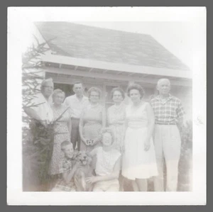 Found Photo 1960's B&W Big Family In Front of House With Dog 3.5 x 3.5  - Picture 1 of 2