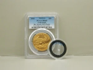 2015 GOLD $50 AM. EAGLE ERROR REV. STRUCK THRU PLASTIC PCGS MS69 WITH PLASTIC - Picture 1 of 8
