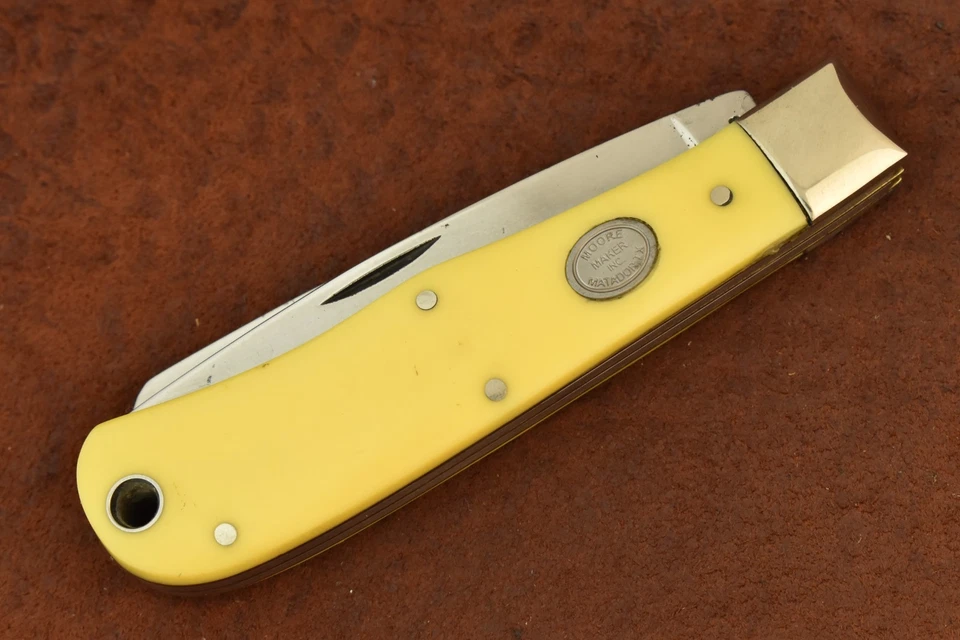 CUCHILLO TRAMPERO JUMBO DELRIN AMARILLO MATADOR TEXAS HECHO EN EE. UU. MOORE MATADOR MATADOR (28361) Foto 1 de 4