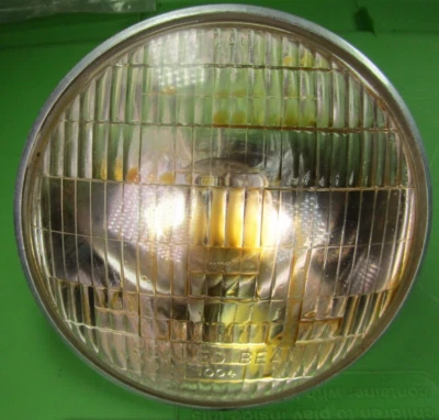 Honda Sport 250 Headlight 6v 35/25 watt🔥6 1/2" od🔥Has Yellow stuff inside - Image 1 of 4