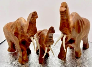 Wooden Elephant Family Figurines Hand Carved from Monkey Tree wood - Picture 1 of 15