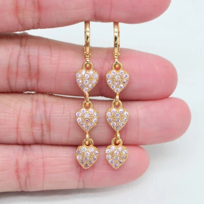 Pendientes colgantes de oro amarillo de 18 quilates rellenos de topacio negro con triple corazón para mujer joyería Foto 1 de 4