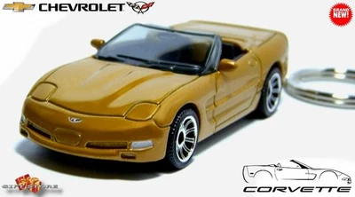 🎁🚦🆕 HTF KEYCHAIN 1997~2005 GOLD CHEVY CORVETTE C5 CONVERTIBLE 💕NICE GIFT💕🎁 - Image 1 of 4