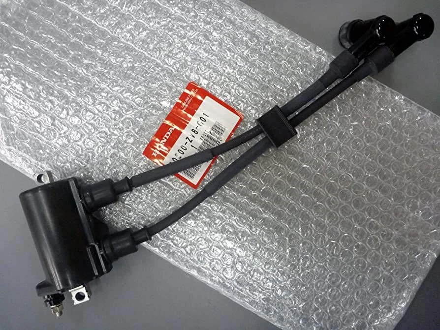 HONDA OUTBOARD BOAT MOTOR ENGINE IGNITION COIL ASSY 30500-ZV8-G01 Genuine OEM - Image 1 of 1