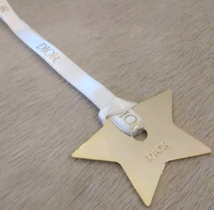 100 % echt Dior Metall Stern Gold Anhänger Ornament Charm mit Dior Band - Bild 1 von 4