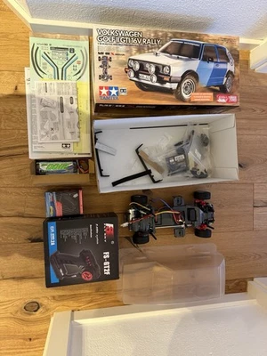 Tamiya Volkswagen Golf II GTI 16V Rally - 300058714 +Starterset Carson Komplett - Bild 1 von 4