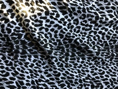 Tela vintage de alta calidad con estampado de animales de leopardo de las nieves Foto 1 de 3